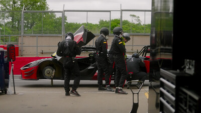 The McLaren team prepares the race car, integrated with the Minima data logger, for  Spa-Francorchamps