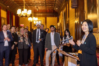 Helen Liu addresses guests during the Blockchain for Good Alliance Impact Leaders&rsquo; Summit at the UK House of Lords, sharing insights on advancing blockchain for societal impact.
