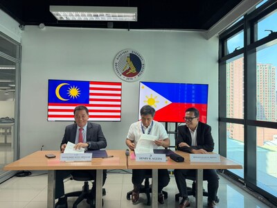 (L&ndash;R) Datuk Mohd Jimmy Wong Abdullah, Chairman of My Blockchain Infrastructure Sdn. Bhd.; Henry R. Aguda, Secretary of the Department of Information and Communications Technology (DICT) of the Philippines; and Ronald Allan M. Aquino, Chairman of Zetrix Philippines Inc., during the exchange of a Memorandum of Understanding to collaborate on implementing the Philippines' public blockchain infrastructure based on the Zetrix protocol.
